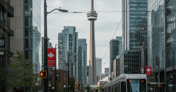 Skyline of Toronto, Canada, with people walking and commuting in the foreground