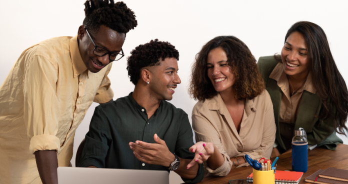 Diverse professionals collaborating in a modern office, representing international career opportunities.